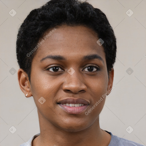 Joyful black young-adult female with short  black hair and brown eyes