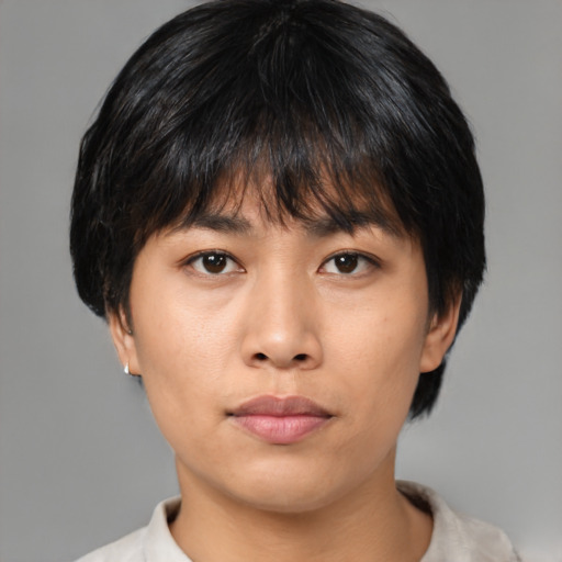 Neutral asian young-adult male with medium  brown hair and brown eyes