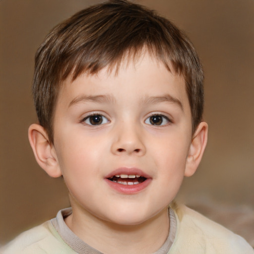 Joyful white child male with short  brown hair and brown eyes