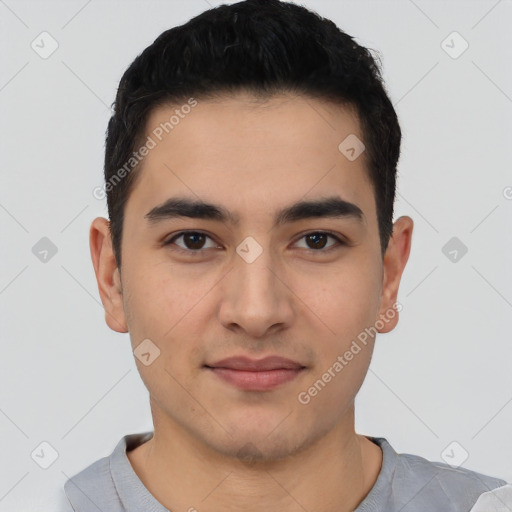 Joyful white young-adult male with short  black hair and brown eyes