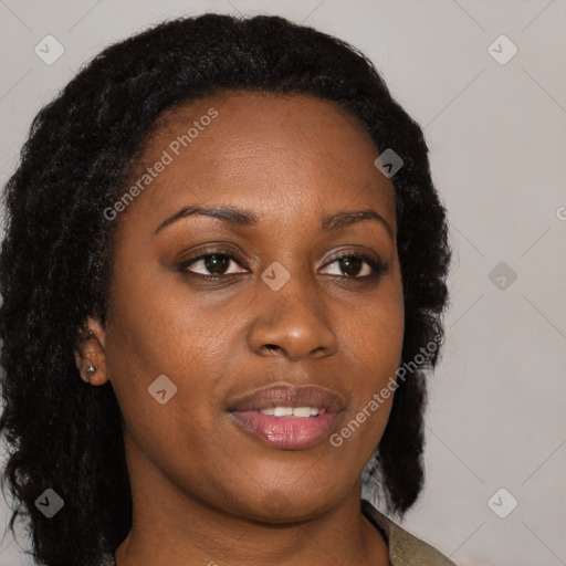 Joyful black young-adult female with medium  brown hair and brown eyes