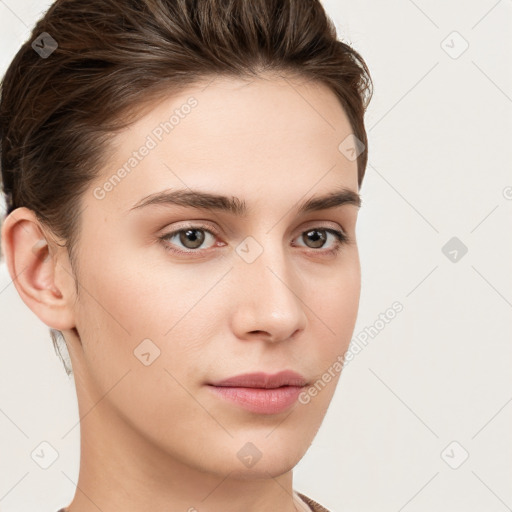 Neutral white young-adult female with short  brown hair and brown eyes