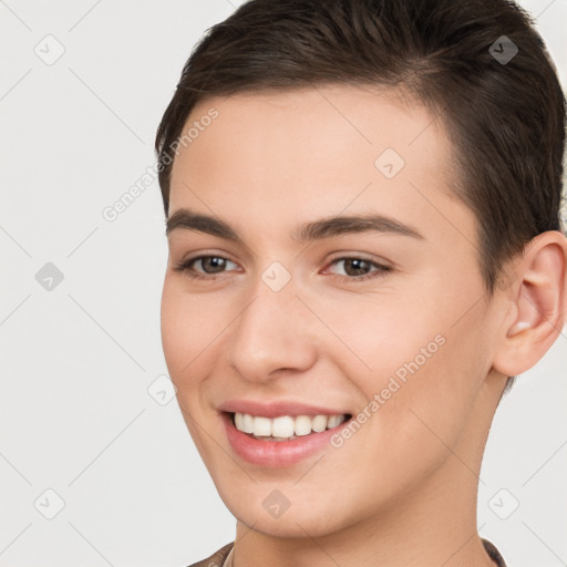 Joyful white young-adult female with short  brown hair and brown eyes