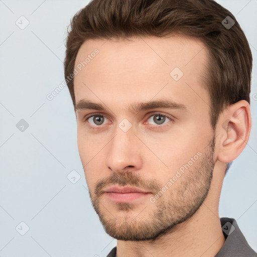 Neutral white young-adult male with short  brown hair and brown eyes