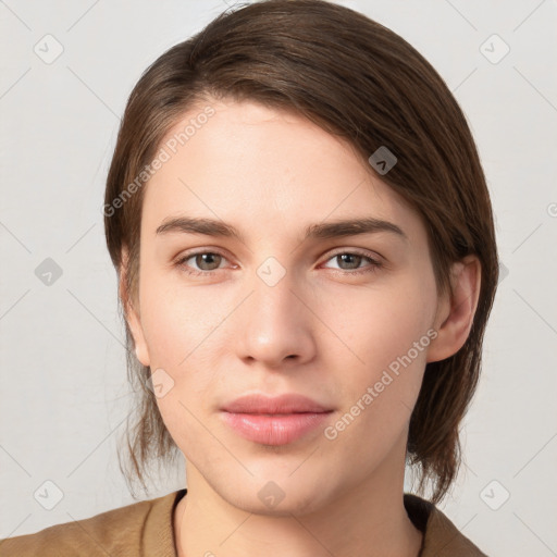 Neutral white young-adult female with medium  brown hair and grey eyes