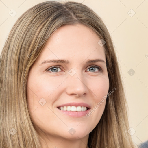 Joyful white young-adult female with long  brown hair and grey eyes