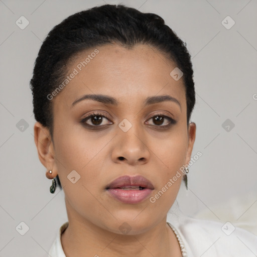 Joyful latino young-adult female with short  black hair and brown eyes