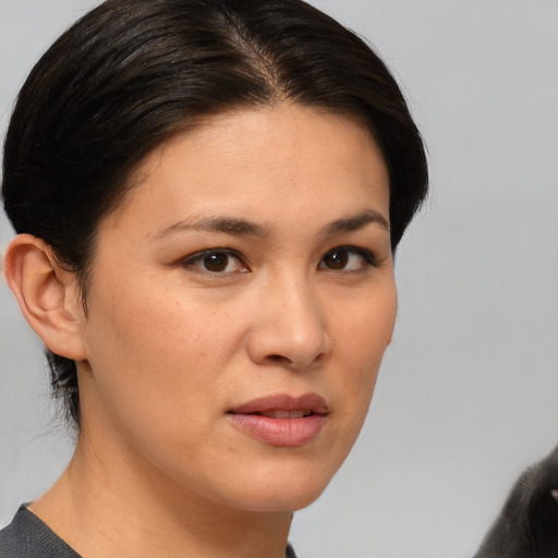 Neutral white young-adult female with medium  brown hair and brown eyes