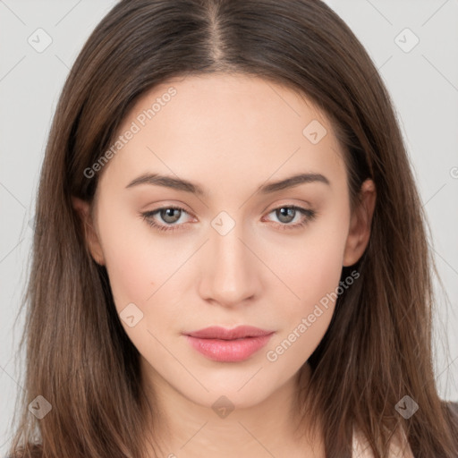 Neutral white young-adult female with long  brown hair and brown eyes