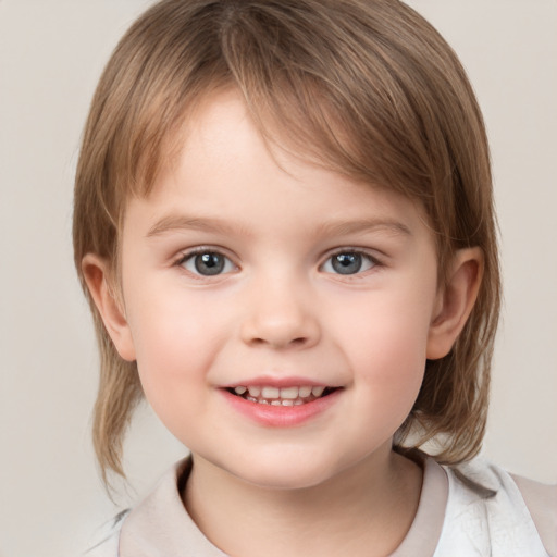 Joyful white child female with medium  brown hair and grey eyes