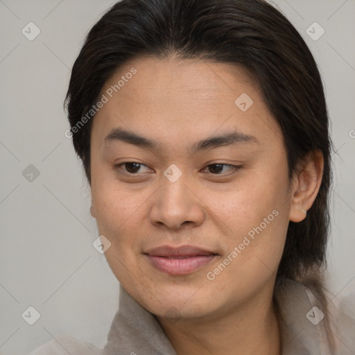 Joyful asian young-adult female with medium  brown hair and brown eyes