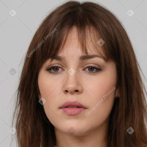 Neutral white young-adult female with long  brown hair and brown eyes