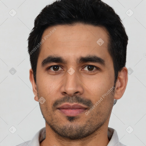 Neutral latino young-adult male with short  black hair and brown eyes