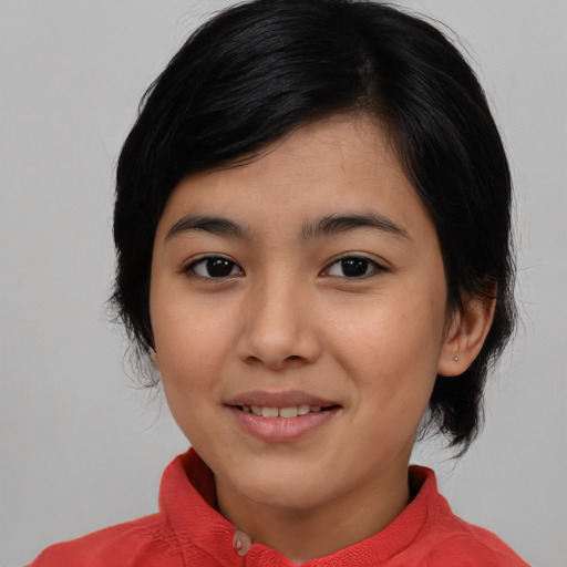 Joyful latino young-adult female with medium  black hair and brown eyes