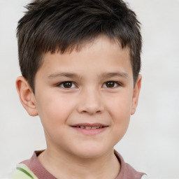 Joyful white child male with short  brown hair and brown eyes