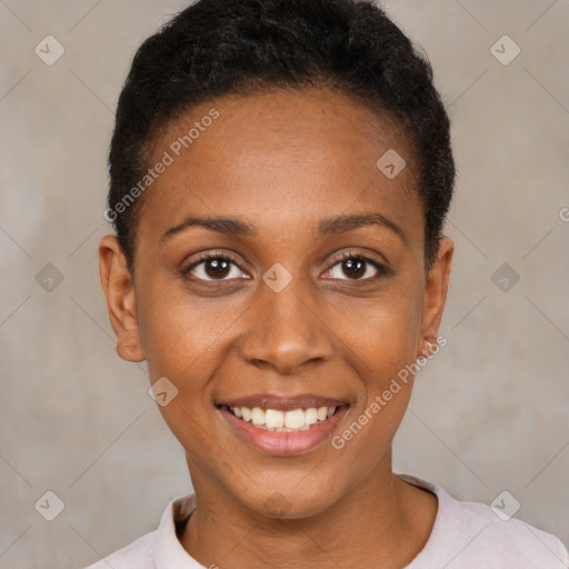 Joyful black young-adult female with short  black hair and brown eyes