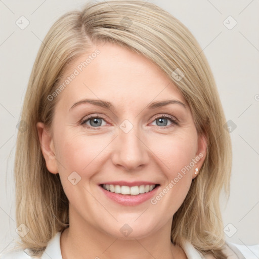 Joyful white young-adult female with medium  brown hair and blue eyes