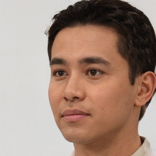 Neutral white young-adult male with short  black hair and brown eyes