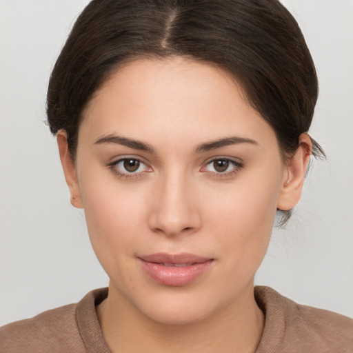 Neutral white young-adult female with medium  brown hair and brown eyes