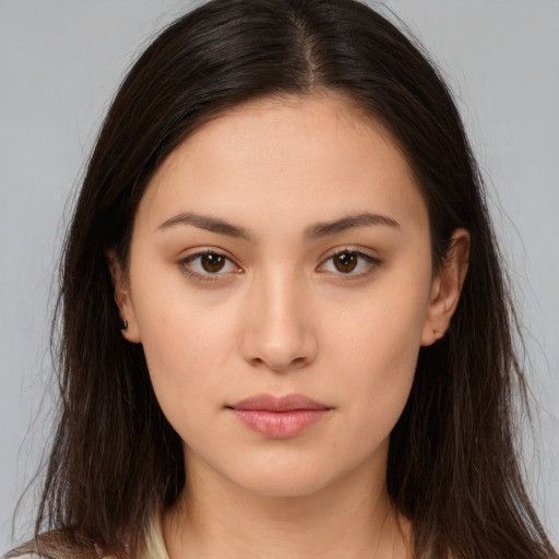 Neutral white young-adult female with long  brown hair and brown eyes