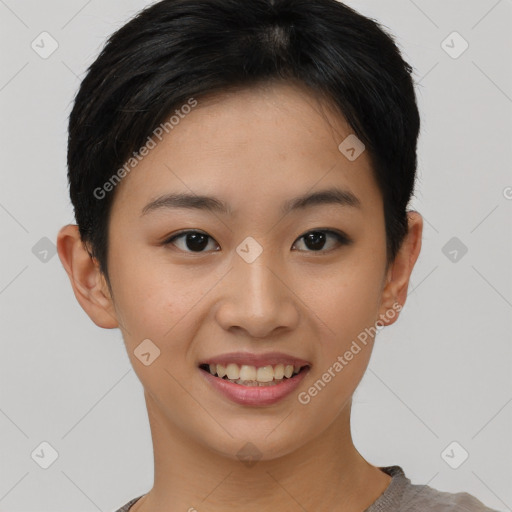 Joyful asian young-adult female with short  brown hair and brown eyes