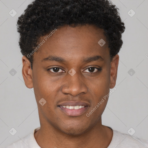 Joyful black young-adult male with short  brown hair and brown eyes