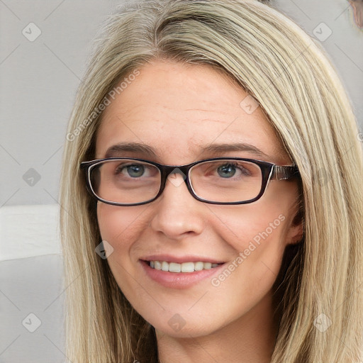 Joyful white young-adult female with long  brown hair and blue eyes