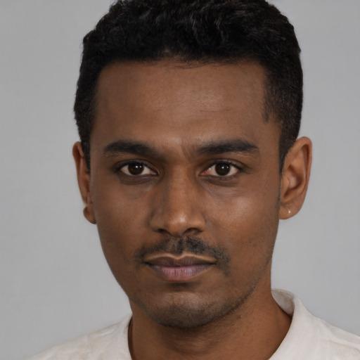 Neutral black young-adult male with short  black hair and brown eyes