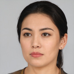 Neutral asian young-adult female with medium  black hair and brown eyes