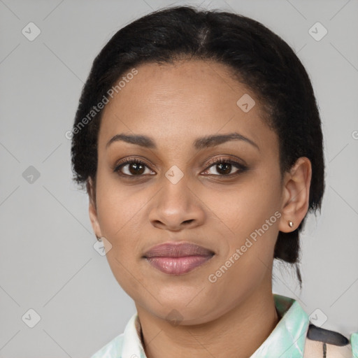 Joyful latino young-adult female with short  brown hair and brown eyes