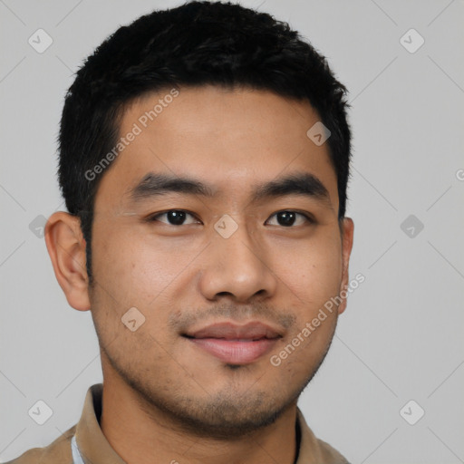 Joyful asian young-adult male with short  black hair and brown eyes