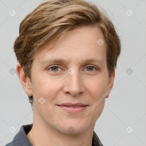 Joyful white adult male with short  brown hair and grey eyes