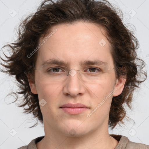 Joyful white adult female with medium  brown hair and green eyes