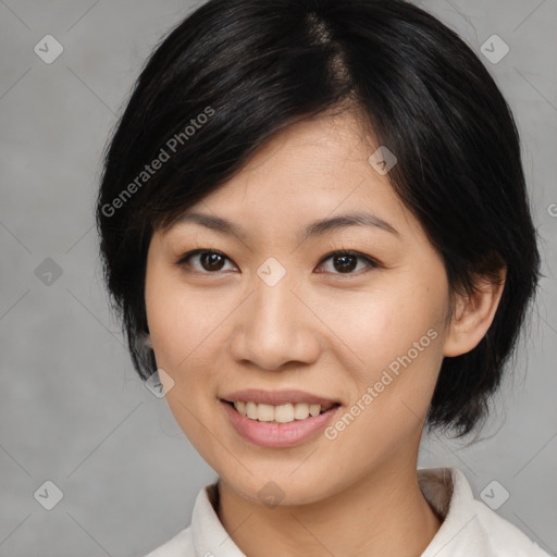 Joyful asian young-adult female with medium  black hair and brown eyes