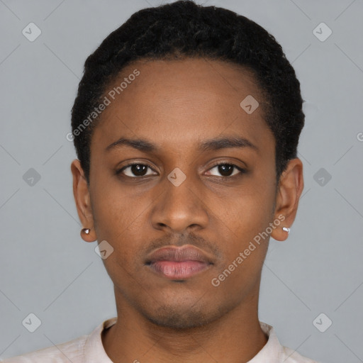 Neutral latino young-adult male with short  black hair and brown eyes