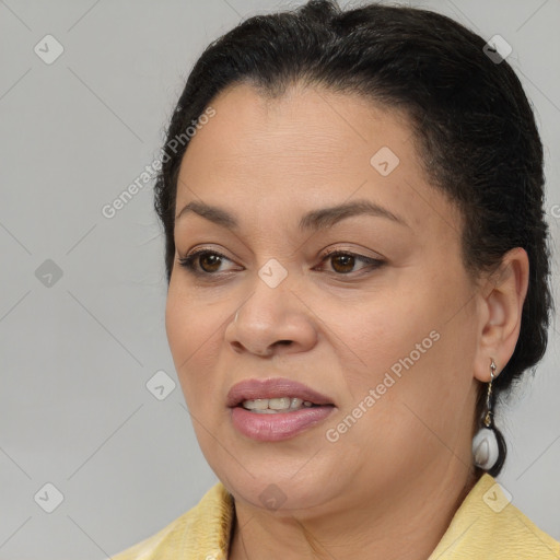 Joyful latino young-adult female with short  brown hair and brown eyes