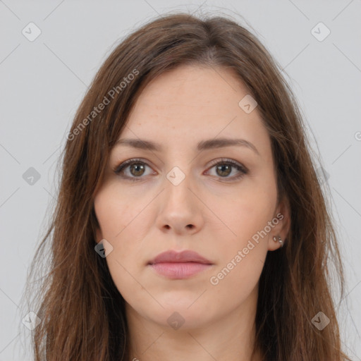 Neutral white young-adult female with long  brown hair and brown eyes