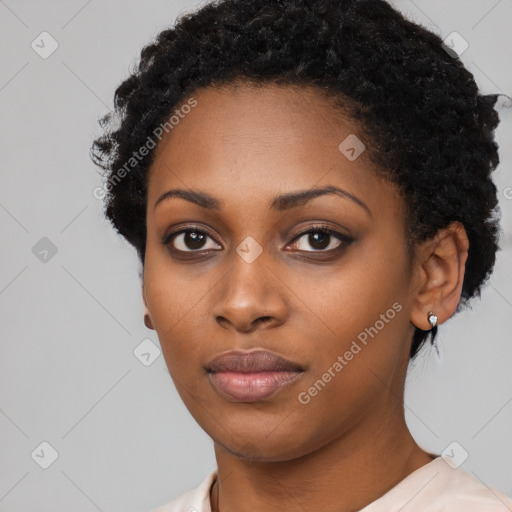 Neutral black young-adult female with short  black hair and brown eyes