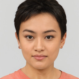 Joyful asian young-adult female with short  brown hair and brown eyes