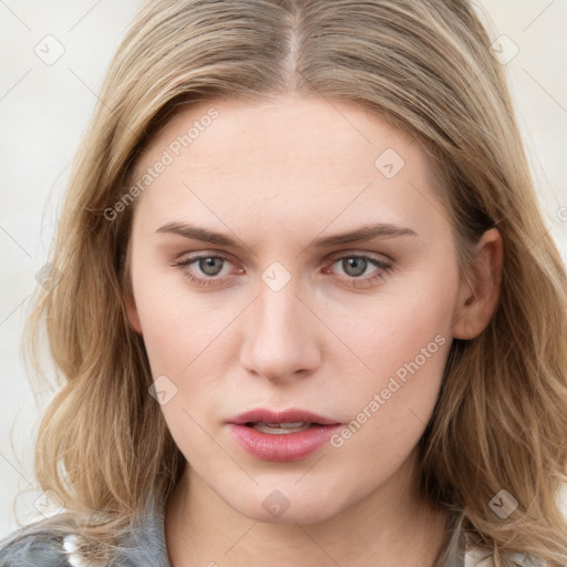 Neutral white young-adult female with long  brown hair and blue eyes