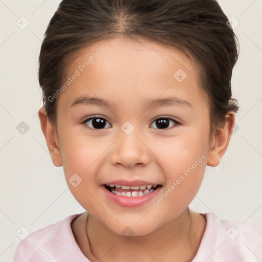 Joyful white child female with short  brown hair and brown eyes