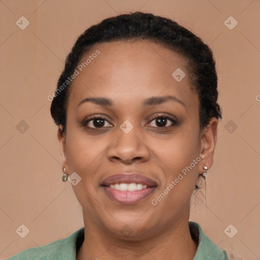 Joyful latino young-adult female with short  brown hair and brown eyes