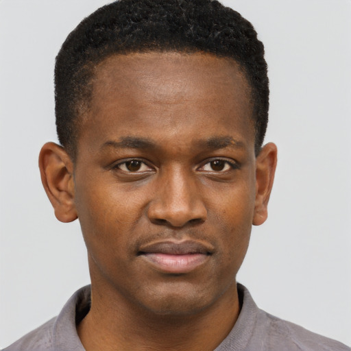 Neutral black young-adult male with short  brown hair and brown eyes