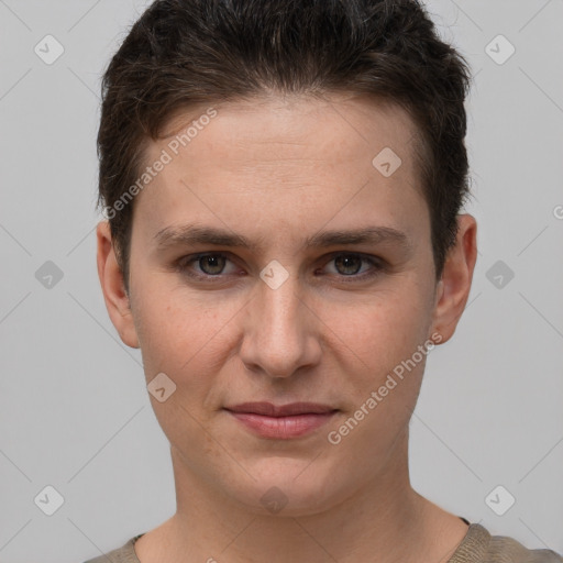 Joyful white young-adult female with short  brown hair and grey eyes