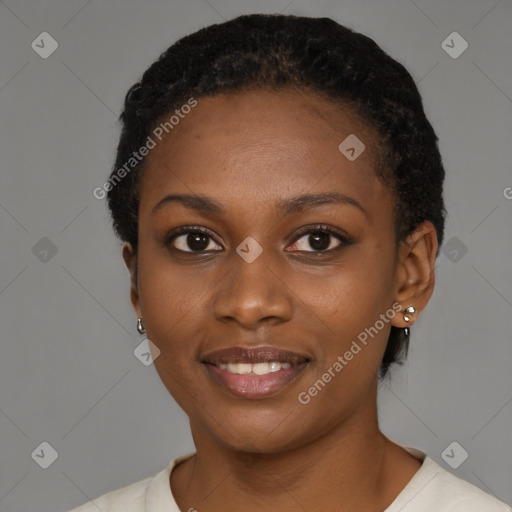 Joyful black young-adult female with short  black hair and brown eyes