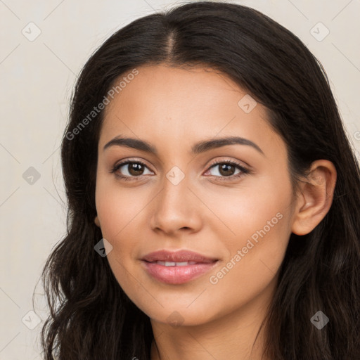 Joyful latino young-adult female with long  brown hair and brown eyes