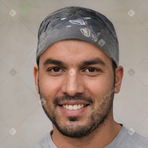 Joyful white young-adult male with short  black hair and brown eyes