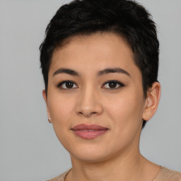 Joyful asian young-adult female with short  brown hair and brown eyes