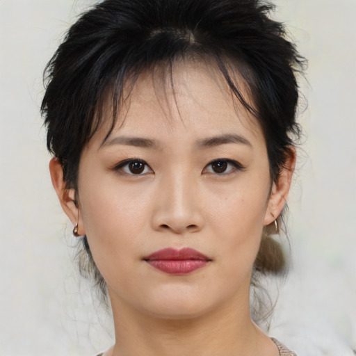 Neutral asian young-adult female with medium  brown hair and brown eyes