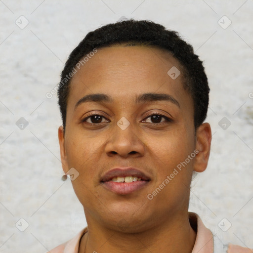 Joyful black young-adult female with short  black hair and brown eyes